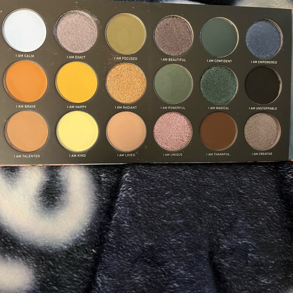 Gold and Green Eyeshadow Palette with Bold Colors